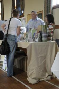 Explaining the concept of eco-coffins to the public Mark Porteous explains eco-coffins at the Energy Fair